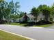 Charming one-story home with well-maintained landscaping and a brick chimney at 8800 Dorchester Rd # 2902, North Charleston, SC 29420