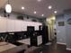 Modern kitchen boasts granite countertops, stainless steel appliances, and ample cabinet space at 8800 Dorchester Rd # 2902, North Charleston, SC 29420