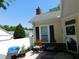 Covered patio with comfortable seating and a view of the well-kept neighborhood at 8800 Dorchester Rd # 2902, North Charleston, SC 29420