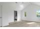 Bright bedroom with wood floors and open entry to bathroom at 924 Trowman Ln, Mount Pleasant, SC 29464