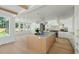 Bright, open kitchen featuring an island, modern lighting, and views to the backyard at 924 Trowman Ln, Mount Pleasant, SC 29464