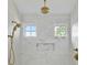 Close up of a marble shower with window at 924 Trowman Ln, Mount Pleasant, SC 29464