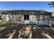The backyard showcases a house with a deck, patio and a well maintained yard, perfect for outdoor enjoyment at 9914 Levenshall Dr, Ladson, SC 29456