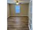 Neutral bedroom with modern flooring, natural light, and a ceiling fan for year-round comfort at 9914 Levenshall Dr, Ladson, SC 29456