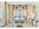 Bright dining room featuring modern lighting, large window, and stylish dining set at 1003 Locals St, Summerville, SC 29485
