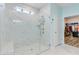 Bathroom shower with sleek tile, built-in bench, glass door, and window for natural light at 1003 Locals St, Summerville, SC 29485
