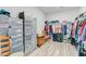 Walk-in closet with extensive shelving, rods for hanging clothes, and ample storage space at 1003 Locals St, Summerville, SC 29485