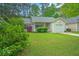 Attractive home with a well-kept lawn and colorful shrubbery enhancing its curb appeal at 1016 Providence Way, Summerville, SC 29483