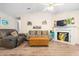 Cozy living room with vaulted ceiling, a fireplace and stylish furniture at 1016 Providence Way, Summerville, SC 29483