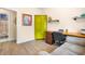 Office featuring wood floors, built-in shelves, and a cozy seating area at 1016 Providence Way, Summerville, SC 29483