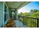 Relaxing balcony with seating, offering picturesque views of the surrounding landscape at 1025 Riverland Woods Pl # 1023, Charleston, SC 29412