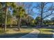 Scenic community park featuring walking paths, grilling area, and lush landscaping perfect for outdoor enjoyment at 1025 Riverland Woods Pl # 1023, Charleston, SC 29412