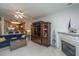 Bright living room offering an open floorplan and a fireplace at 1025 Riverland Woods Pl # 1023, Charleston, SC 29412