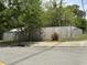 A wood fence in a backyard defines a backyard border, providing privacy to the property at 104 Waccamaw Dr, Summerville, SC 29485