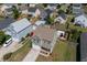 Aerial shot of the home with a well-kept lawn, driveway, and nearby community pool at 1097 Briar Rose Ln, Ladson, SC 29456