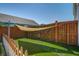 Fenced in backyard with a privacy screen and artificial turf at 1097 Briar Rose Ln, Ladson, SC 29456
