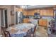 Bright kitchen adjacent to a cozy dining area, featuring modern appliances and ample cabinet space at 1097 Briar Rose Ln, Ladson, SC 29456