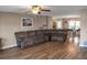 Spacious living room with hardwood floors, comfortable seating, and plenty of natural light at 1097 Briar Rose Ln, Ladson, SC 29456