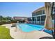 A backyard swimming pool with landscaping, slide, and patio area perfect for relaxation and entertainment at 1097 Briar Rose Ln, Ladson, SC 29456