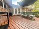 Outdoor living on back deck with patio furniture, lush green scenery and access to home at 114 California Ave, Moncks Corner, SC 29461