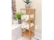 Bathroom shelf with rolled white towels, decorative plant, and stylish design for a spa-like feel at 114 California Ave, Moncks Corner, SC 29461