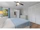 Spacious bedroom with a ceiling fan, closet and light blue accents at 114 California Ave, Moncks Corner, SC 29461