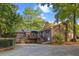 Lovely brick home featuring an expansive back deck with stairs, perfect for outdoor entertaining at 114 California Ave, Moncks Corner, SC 29461