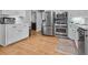 Well-lit kitchen with stainless steel appliances and wood floors at 114 California Ave, Moncks Corner, SC 29461