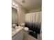 Bathroom featuring a single sink vanity and a shower with a forest-themed curtain at 1220 Apex Ln, Charleston, SC 29412