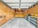 Unfinished garage with shelving, storage, and concrete floor for parking or projects at 1300 Park West Blvd # 101, Mount Pleasant, SC 29466