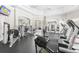 Well-equipped gym featuring treadmills and weight-lifting machines, providing a comprehensive fitness experience at 1300 Park West Blvd # 101, Mount Pleasant, SC 29466