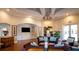 Well decorated living room featuring a TV, comfortable couches, and stylish decor, creating a welcoming atmosphere at 1300 Park West Blvd # 101, Mount Pleasant, SC 29466