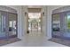 Entrance featuring access to a pool with outdoor seating and well-maintained landscaping at 1300 Park West Blvd # 101, Mount Pleasant, SC 29466