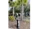 Community call box surrounded by lush greenery, ensuring secure and easy access for visitors at 1300 Park West Blvd # 406, Mount Pleasant, SC 29466