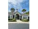 Community center exterior featuring classic architecture, well-manicured landscaping, and a welcoming entrance at 1300 Park West Blvd # 406, Mount Pleasant, SC 29466