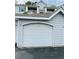 Garage door in a building with a light blue exterior at 1300 Park West Blvd # 406, Mount Pleasant, SC 29466