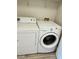 Laundry room with full size washer and dryer at 1300 Park West Blvd # 406, Mount Pleasant, SC 29466