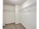 Walk-in closet with carpet flooring and wire shelving for ample storage space at 131 Buchanan Cir, Goose Creek, SC 29445