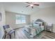 Bedroom with vaulted ceiling, ceiling fan, stylish furniture, decor, and a window with natural light at 131 Buchanan Cir, Goose Creek, SC 29445