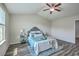 Bedroom with vaulted ceiling, ceiling fan, stylish furniture, decor, and a window at 131 Buchanan Cir, Goose Creek, SC 29445