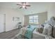 Bedroom with vaulted ceiling, ceiling fan, stylish furniture, decor, and a window at 131 Buchanan Cir, Goose Creek, SC 29445