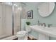 Bathroom with walk-in shower, pedestal sink, and modern fixtures at 1325 Whisker Pole Ln, Mount Pleasant, SC 29466