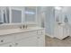 Elegant bathroom showcasing a marble countertop and pristine white cabinetry, creating a calming spa feel at 1325 Whisker Pole Ln, Mount Pleasant, SC 29466