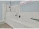 Relaxing bathroom featuring a soaking tub, glass shower, and bright natural light, ideal for unwinding at 1325 Whisker Pole Ln, Mount Pleasant, SC 29466