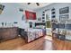 Cozy bedroom featuring a sports theme, wood floors, and a window with natural light at 1325 Whisker Pole Ln, Mount Pleasant, SC 29466