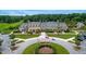 Exterior aerial view of the clubhouse with flags and parking at 1325 Whisker Pole Ln, Mount Pleasant, SC 29466