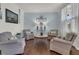 Cozy living room featuring comfortable seating, stylish decor, and ample natural light at 1325 Whisker Pole Ln, Mount Pleasant, SC 29466