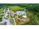 Aerial view of the outdoor swimming pool and neighborhood at 1325 Whisker Pole Ln, Mount Pleasant, SC 29466