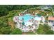 Aerial view of the outdoor waterpark with pool, slide, and plenty of seating at 1325 Whisker Pole Ln, Mount Pleasant, SC 29466