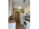 Functional kitchen features white appliances and neutral countertops at 136 Gailmoor Dr, Ladson, SC 29456
